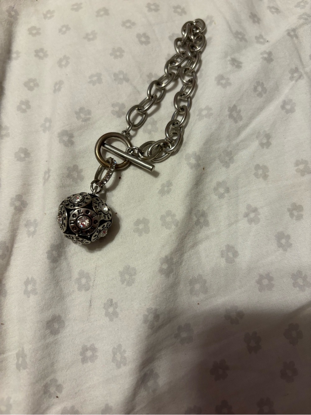 Guess Silver-Tone Filigree Charm Toggle Bracelet with Pink Crystal